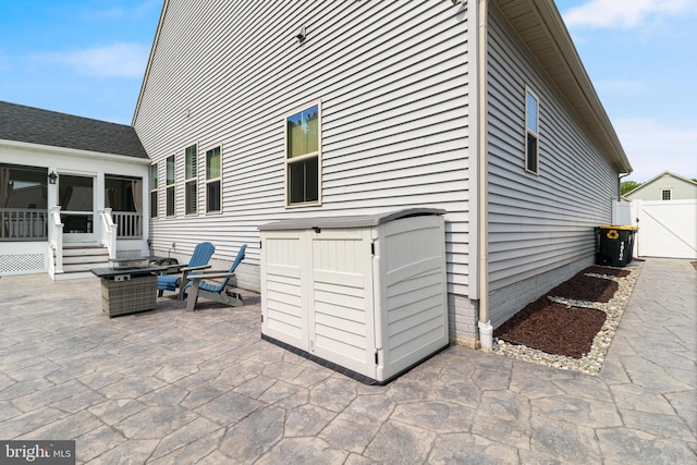 10104 Dressage Dr, Upper Marlboro, MD 20772 - view of patio with a gate and a sunroom
