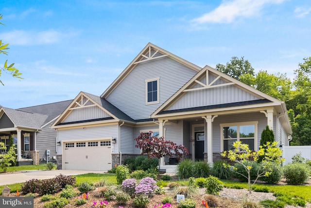 10104 Dressage Dr, Upper Marlboro, MD 20772 - craftsman inspired home with board and batten siding, covered porch, stone siding, an attached garage, and concrete driveway