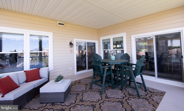 301 Muir St Unit 201, Cambridge, MD 21613 - view of patio featuring an outdoor hangout area and outdoor dining area