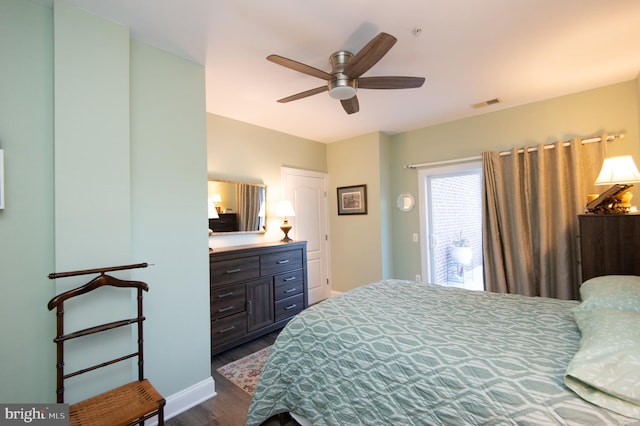301 Muir St Unit 201, Cambridge, MD 21613 - bedroom featuring dark wood-style floors and ceiling fan