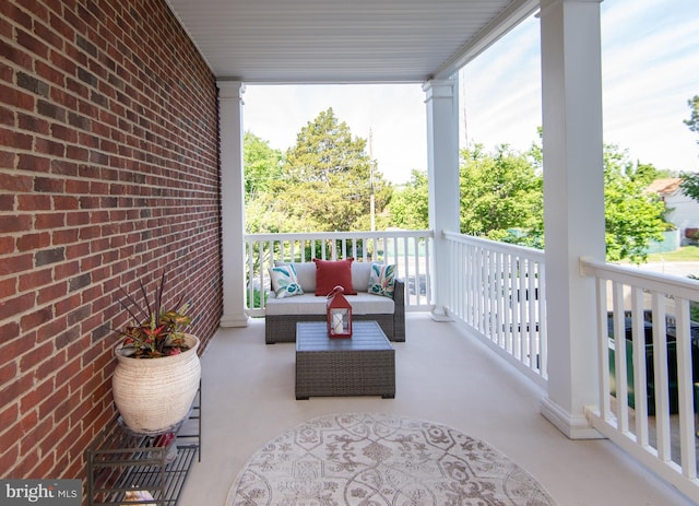 301 Muir St Unit 201, Cambridge, MD 21613 - balcony with an outdoor living space