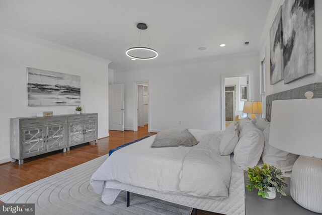 5127 Cathedral Ave NW, Washington, DC 20016 - bedroom featuring ornamental molding, wood finished floors, recessed lighting, and baseboards