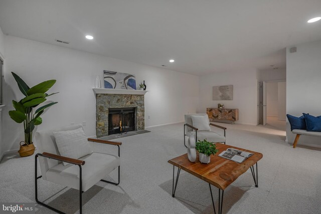 5127 Cathedral Ave NW, Washington, DC 20016 - carpeted living room featuring a fireplace, recessed lighting, and baseboards
