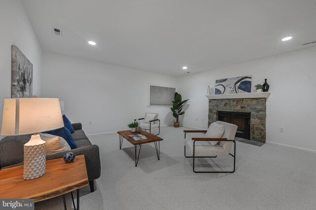 5127 Cathedral Ave NW, Washington, DC 20016 - carpeted living room with a fireplace, recessed lighting, and baseboards