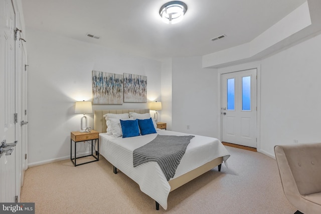 5127 Cathedral Ave NW, Washington, DC 20016 - bedroom with light carpet and baseboards