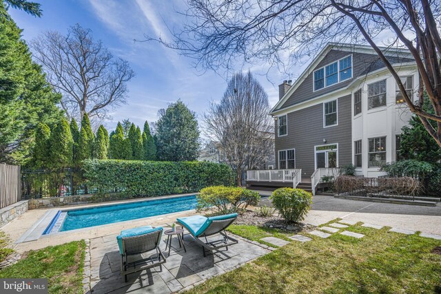 5127 Cathedral Ave NW, Washington, DC 20016 - view of swimming pool featuring a deck and a patio