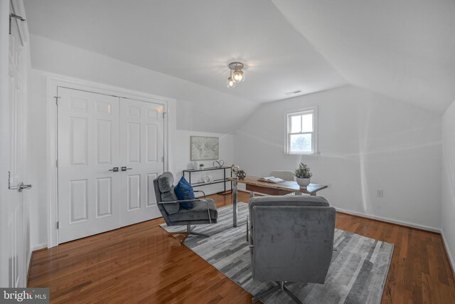 5127 Cathedral Ave NW, Washington, DC 20016 - living area with vaulted ceiling, wood finished floors, and an office area