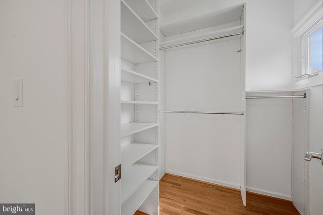 5127 Cathedral Ave NW, Washington, DC 20016 - walk in closet with wood finished floors