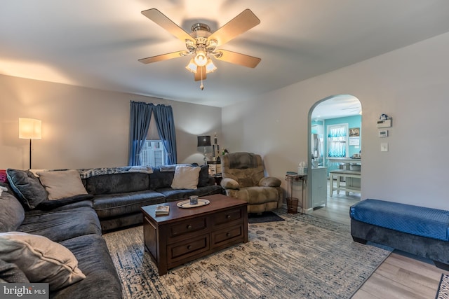 46 Jefferson St, Weatherly, PA 18255 - living area with a ceiling fan, arched walkways, and wood finished floors