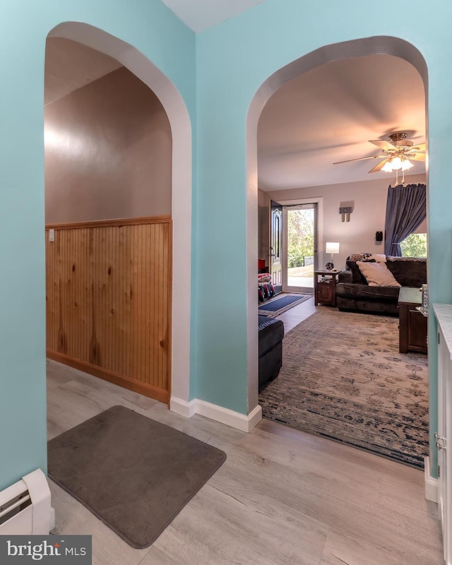 46 Jefferson St, Weatherly, PA 18255 - hall featuring arched walkways, wood finished floors, and baseboard heating