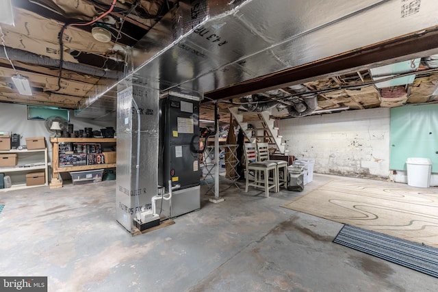 46 Jefferson St, Weatherly, PA 18255 - unfinished basement featuring stairway and heating unit