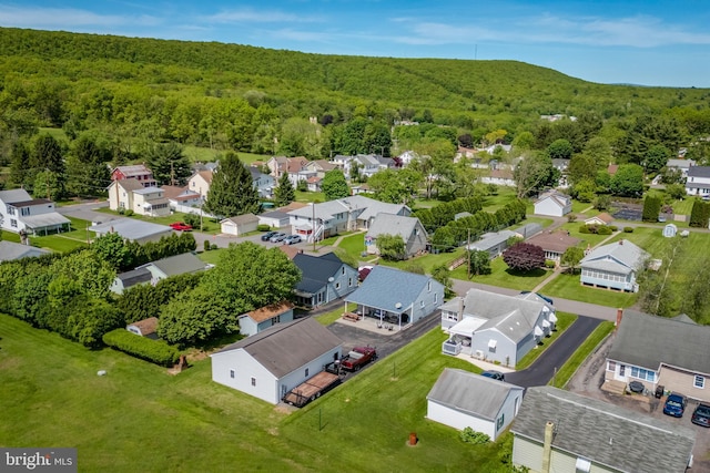 46 Jefferson St, Weatherly, PA 18255 - aerial perspective of suburban area featuring a heavily wooded area