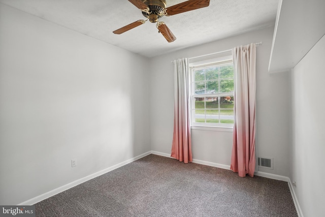 900 W Nolcrest Dr, Silver Spring, MD 20903 - spare room with dark colored carpet, baseboards, and ceiling fan