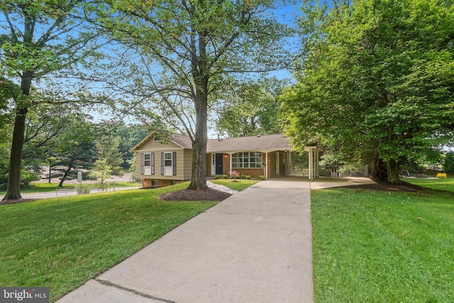 900 W Nolcrest Dr, Silver Spring, MD 20903 - ranch-style home featuring a front lawn and brick siding