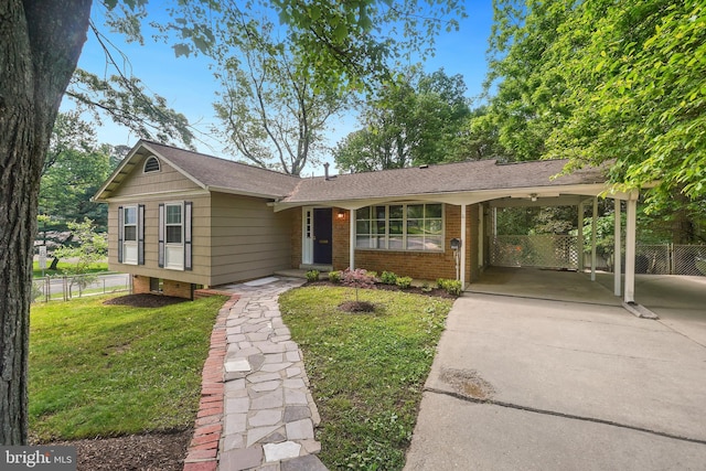 900 W Nolcrest Dr, Silver Spring, MD 20903 - view of front of property featuring concrete driveway, an attached carport, brick siding, and roof with shingles