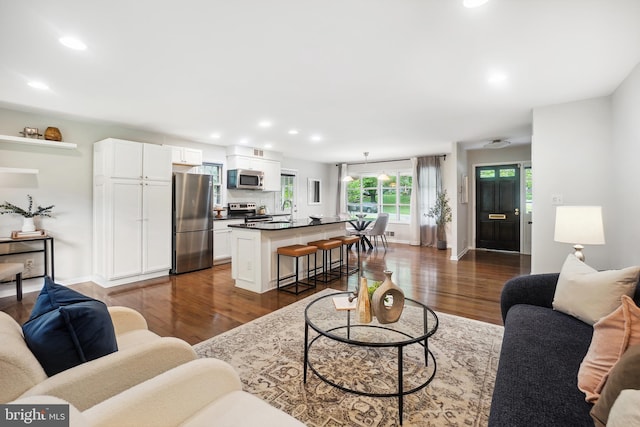 900 W Nolcrest Dr, Silver Spring, MD 20903 - living room with recessed lighting, dark wood-style flooring, and baseboards