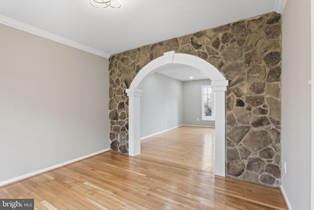 941 Sherwood Ct, Sterling, VA 20164 - empty room with arched walkways, hardwood / wood-style floors, ornamental molding, and decorative columns