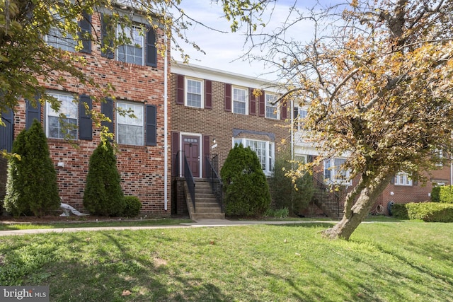 941 Sherwood Ct, Sterling, VA 20164 - view of front facade featuring a front yard and brick siding