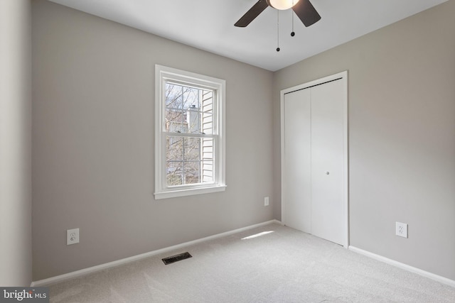 941 Sherwood Ct, Sterling, VA 20164 - unfurnished bedroom featuring carpet floors, a closet, baseboards, and ceiling fan