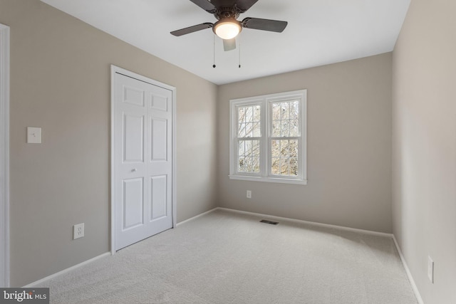 941 Sherwood Ct, Sterling, VA 20164 - unfurnished bedroom featuring carpet, baseboards, a closet, and ceiling fan