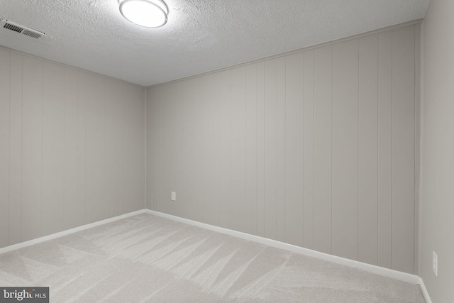 941 Sherwood Ct, Sterling, VA 20164 - carpeted spare room with a textured ceiling