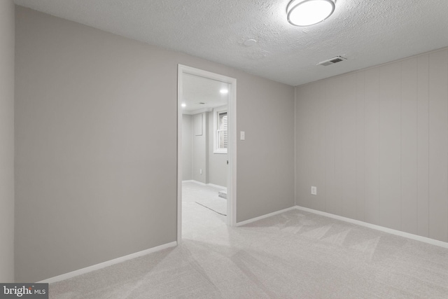 941 Sherwood Ct, Sterling, VA 20164 - unfurnished room with carpet, a textured ceiling, and baseboards