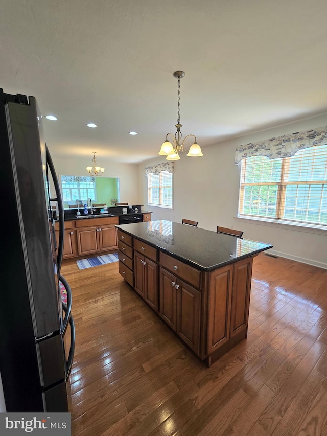 7677 Green Ridge Ln, Abbottstown, PA 17301 - kitchen featuring black appliances, a chandelier, healthy amount of natural light, dark wood-style flooring, and recessed lighting
