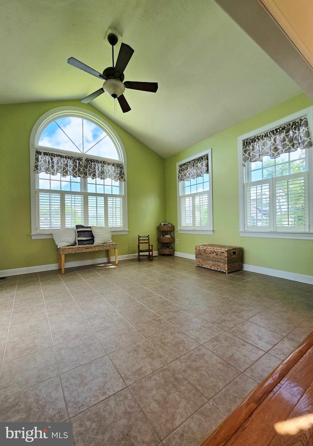 7677 Green Ridge Ln, Abbottstown, PA 17301 - living area with tile patterned floors, vaulted ceiling, baseboards, and ceiling fan