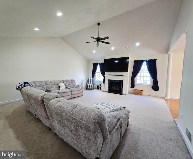 7677 Green Ridge Ln, Abbottstown, PA 17301 - carpeted living area featuring vaulted ceiling, a ceiling fan, recessed lighting, baseboards, and a fireplace
