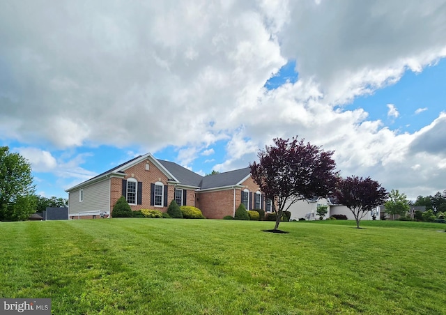 7677 Green Ridge Ln, Abbottstown, PA 17301 - single story home with brick siding and a front lawn
