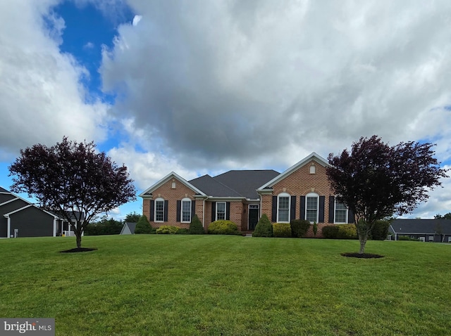 7677 Green Ridge Ln, Abbottstown, PA 17301 - view of front of home with brick siding and a front yard