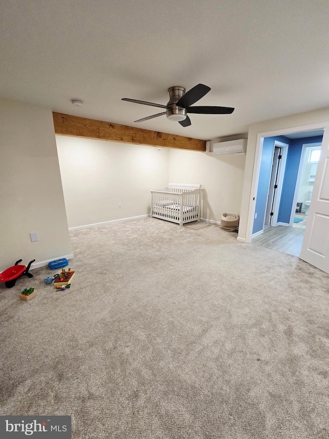 7677 Green Ridge Ln, Abbottstown, PA 17301 - empty room featuring a wall unit AC, carpet, ceiling fan, baseboards, and beamed ceiling