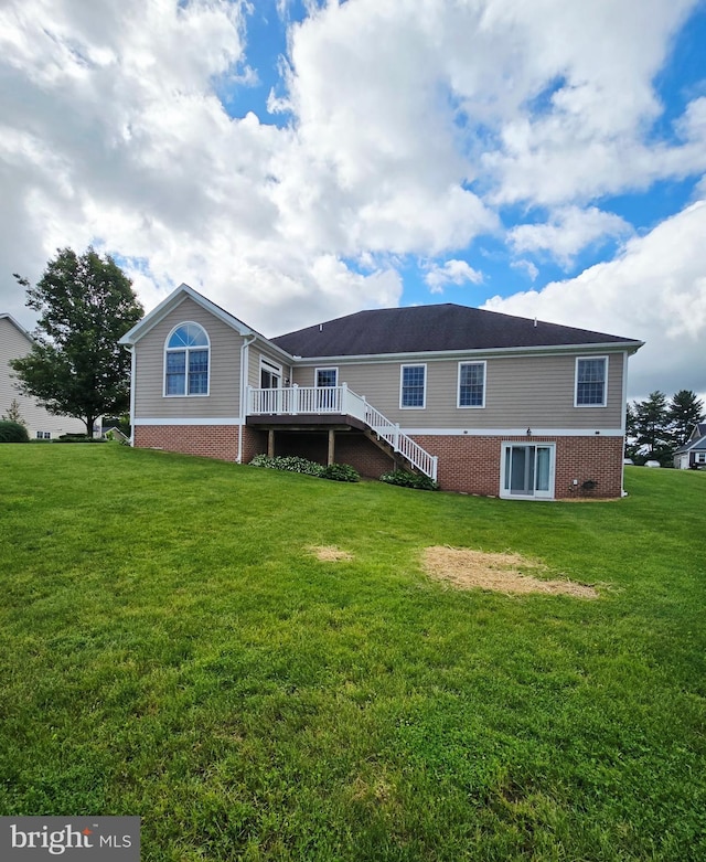 7677 Green Ridge Ln, Abbottstown, PA 17301 - back of house with a yard, a deck, stairs, and brick siding