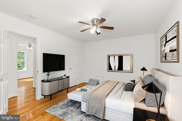 1118 Ashby St, Front Royal, VA 22630 - bedroom with light wood-type flooring, ceiling fan, and baseboards