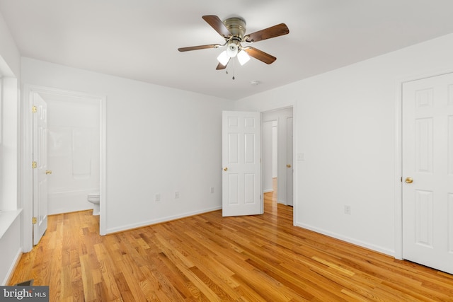 1118 Ashby St, Front Royal, VA 22630 - unfurnished bedroom featuring light wood-type flooring, baseboards, and ensuite bath