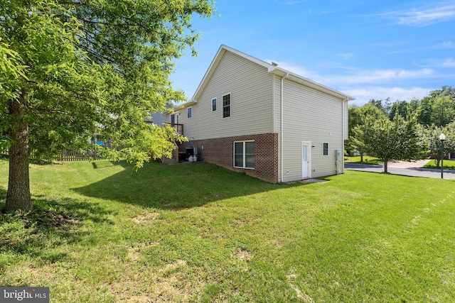 1118 Ashby St, Front Royal, VA 22630 - view of home's exterior with a yard and brick siding