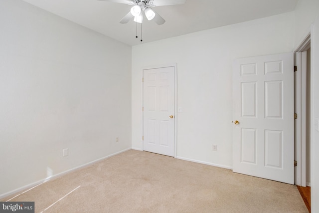 1530 Spring Gate Dr Unit 9308, Mclean, VA 22102 - unfurnished bedroom with light carpet, baseboards, and ceiling fan