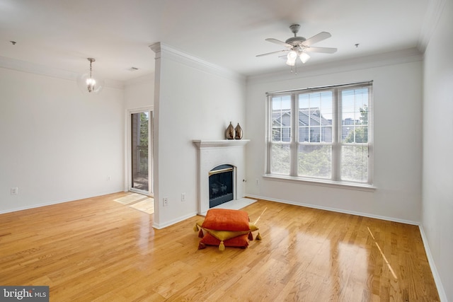1530 Spring Gate Dr Unit 9308, Mclean, VA 22102 - unfurnished living room with ornamental molding, wood finished floors, a fireplace with flush hearth, a ceiling fan, and baseboards
