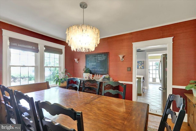 61 Park Rd, Reading, PA 19609 - dining area featuring plenty of natural light, a chandelier, ornamental molding, light tile patterned floors, and baseboards