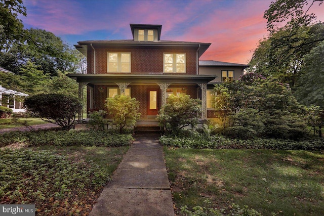 61 Park Rd, Reading, PA 19609 - american foursquare style home with covered porch and brick siding