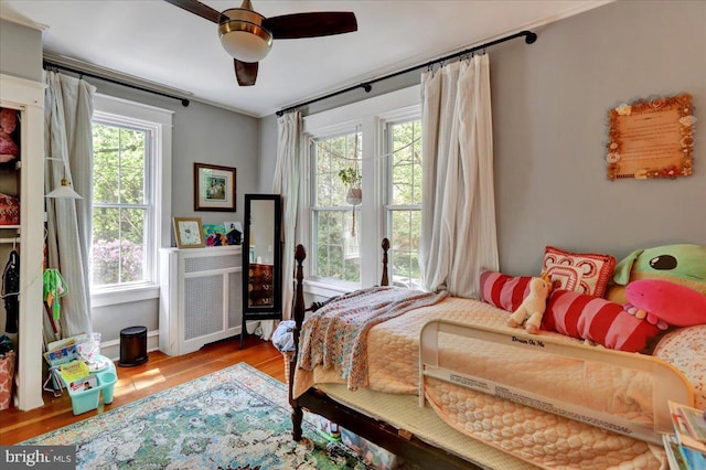 61 Park Rd, Reading, PA 19609 - bedroom with multiple windows, wood finished floors, and ceiling fan