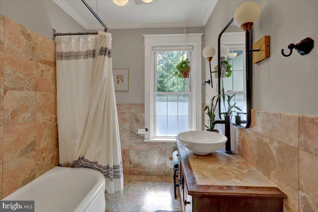 61 Park Rd, Reading, PA 19609 - bathroom featuring tile walls, ornamental molding, shower / tub combo with curtain, and vanity