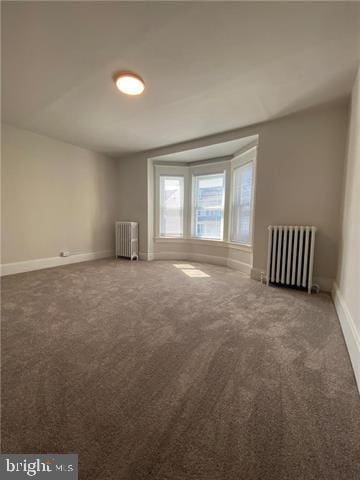 31 E Goepp St, Bethlehem, PA 18018 - carpeted empty room featuring radiator heating unit, radiator, and baseboards