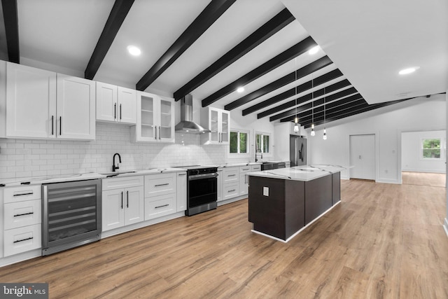 2761 Ebbvale Rd, Manchester, MD 21102 - kitchen featuring wall chimney exhaust hood, beverage cooler, range with electric stovetop, stainless steel fridge, and tasteful backsplash