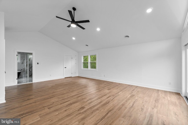 2761 Ebbvale Rd, Manchester, MD 21102 - unfurnished living room with a ceiling fan, vaulted ceiling, wood finished floors, baseboards, and recessed lighting