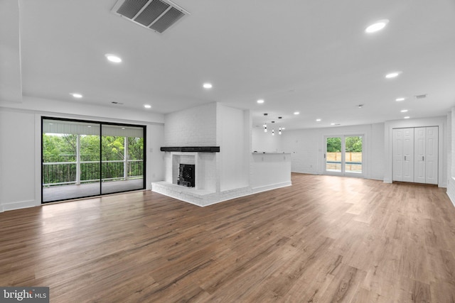 2761 Ebbvale Rd, Manchester, MD 21102 - unfurnished living room with light wood-style floors, recessed lighting, a fireplace, and baseboards