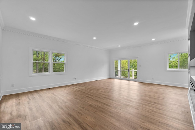 2761 Ebbvale Rd, Manchester, MD 21102 - unfurnished living room with crown molding, baseboards, light wood-type flooring, and recessed lighting