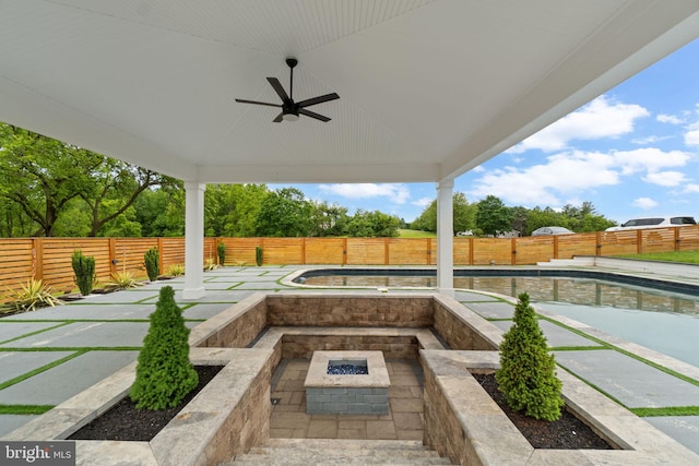 2761 Ebbvale Rd, Manchester, MD 21102 - fenced backyard with a ceiling fan and a fire pit