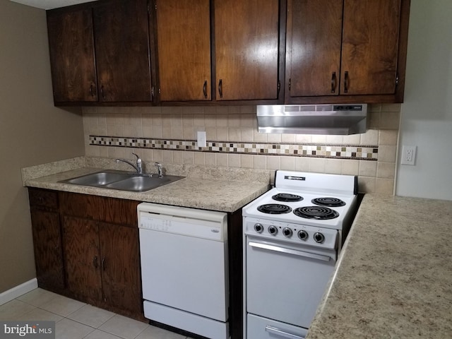 1320 Oak Ln, New Cumberland, PA 17070 - kitchen with white appliances, under cabinet range hood, a sink, light countertops, and dark brown cabinets