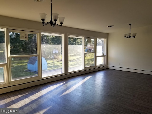 1320 Oak Ln, New Cumberland, PA 17070 - unfurnished dining area with a chandelier and dark wood-style floors